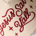 Jesus Saves Y'all trucker hat with beige camo brim, side view