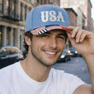 USA embroidered denim trucker hat, front view alternate angle