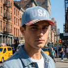 USA embroidered denim trucker hat, styled view