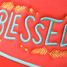 Blessed checker foam trucker hat in coral, side view