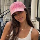 Model wearing JesusGrl embroidered corduroy rope trucker hat