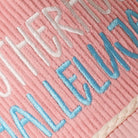 Motherhood Hallelujah corduroy rope trucker hat in baby pink, side view