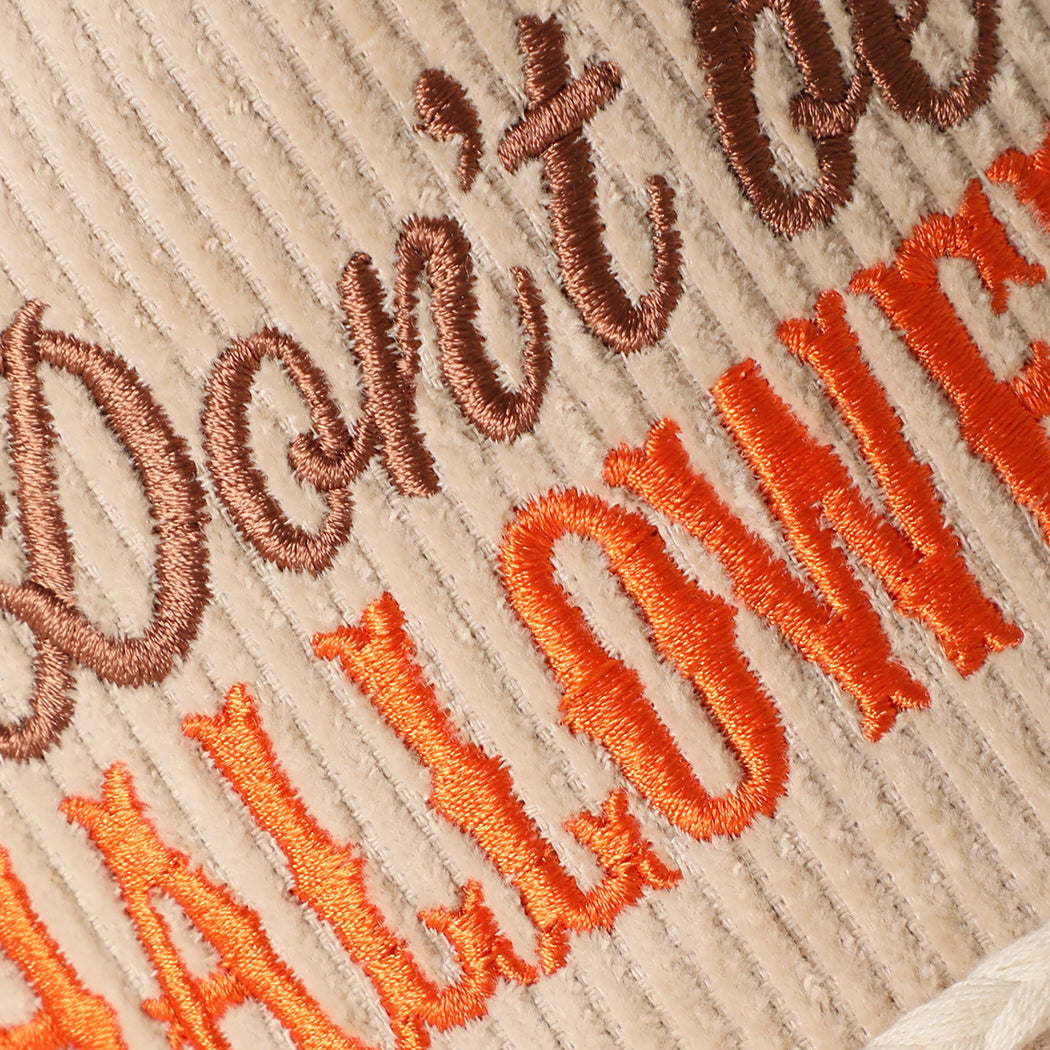 Don't Be a Halloweenie corduroy rope trucker hat in sand, angled view