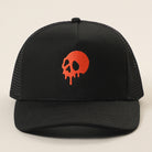 Skull Drip mesh trucker hat in black and orange