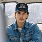 Take Me To The Mountains embroidered trucker hat, front view