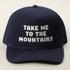 Take Me To The Mountains trucker hat in royal blue