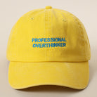 Professional Overthinker washed baseball cap in yellow