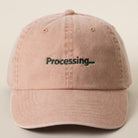 Processing embroidered baseball cap in cinnamon