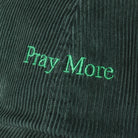 Pray More corduroy baseball cap in dark green, side view
