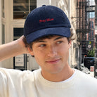 Pray More embroidered corduroy baseball cap, front view