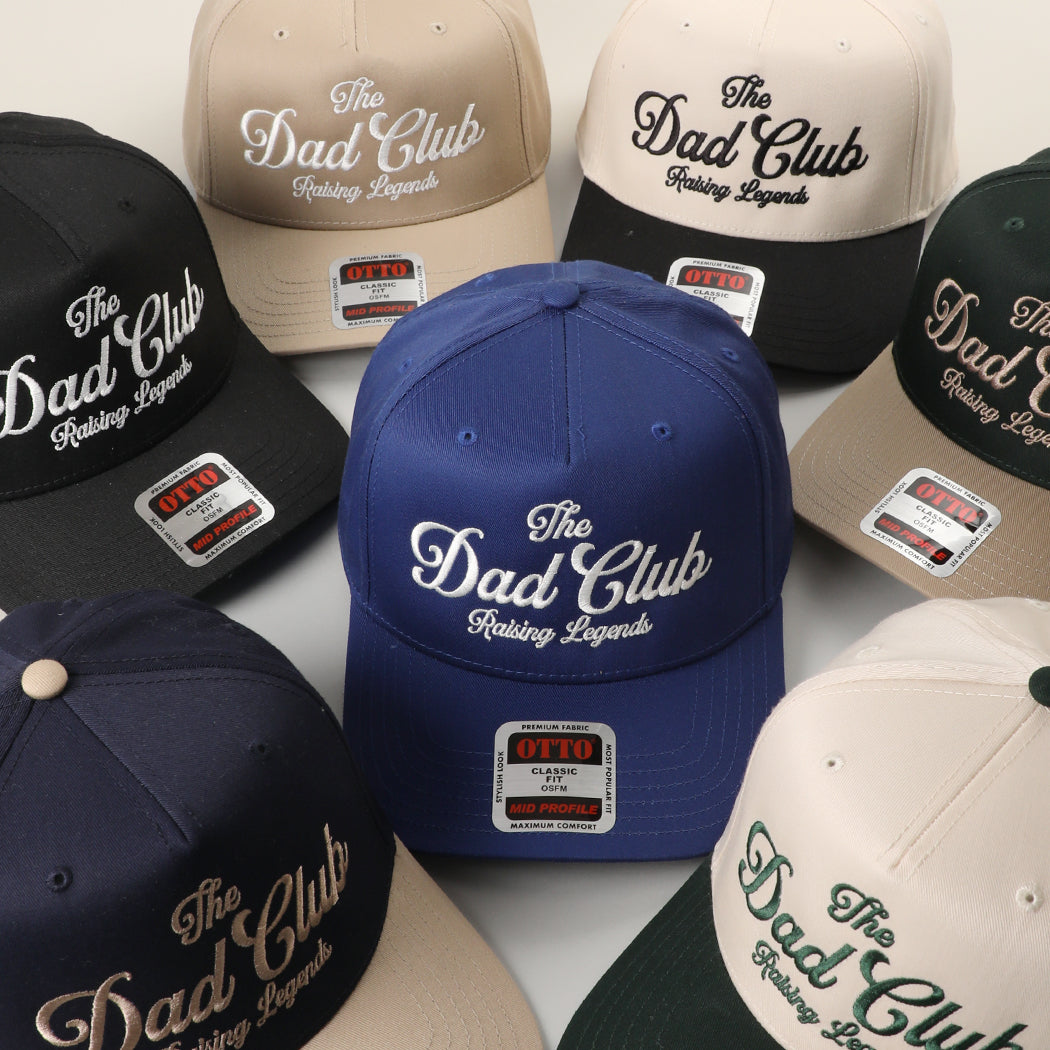 The Dad Club Raising Legends embroidered trucker hat, all color options