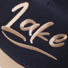 Lake OTTO two-tone trucker hat in khaki and navy, side view