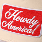 Howdy America camo brim trucker hat in blue, side view