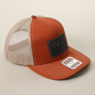 Black American Flag patch trucker hat in orange and khaki, detail view