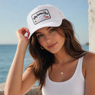 Woman wearing Silly Goose Club patch foam trucker hat