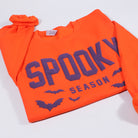 Spooky Season bold puff sweatshirt in orange, back view