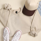 Espresso Club graphic sweatshirt in sand, detail view