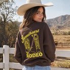 Model wearing Sweetheart of the Rodeo graphic sweatshirt