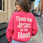 Model wearing Thank You Jesus For The Blood graphic sweatshirt