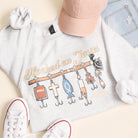Hooked on Jesus graphic sweatshirt in ash grey