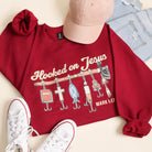 Hooked on Jesus graphic sweatshirt in burgundy