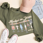 Hooked on Jesus graphic sweatshirt in military green