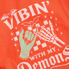 Vibin' With My Demons graphic sweatshirt in orange, detail view