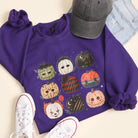 Halloween Horror Pumpkins graphic sweatshirt in purple