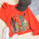 Spooky Cactus ghost graphic sweatshirt in orange