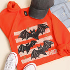 Halloween Bats striped graphic sweatshirt in orange