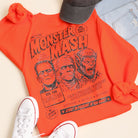 Monster Mash Halloween graphic sweatshirt in orange