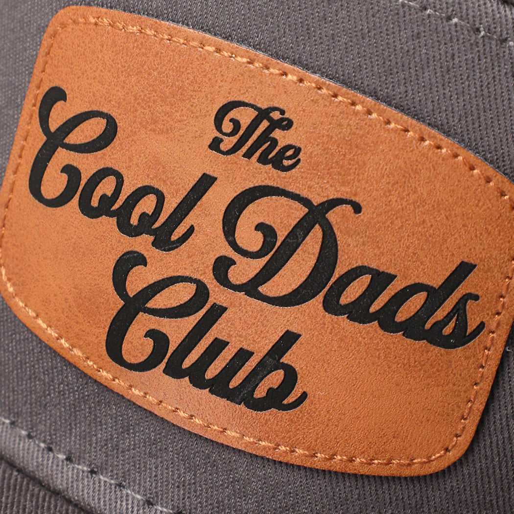The Cool Dads Club 7-panel snapback hat in charcoal grey, side view